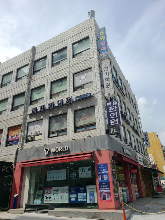 암사동 대로변 코너자리에 위치한 이동통신점 매물의 6번째 사진